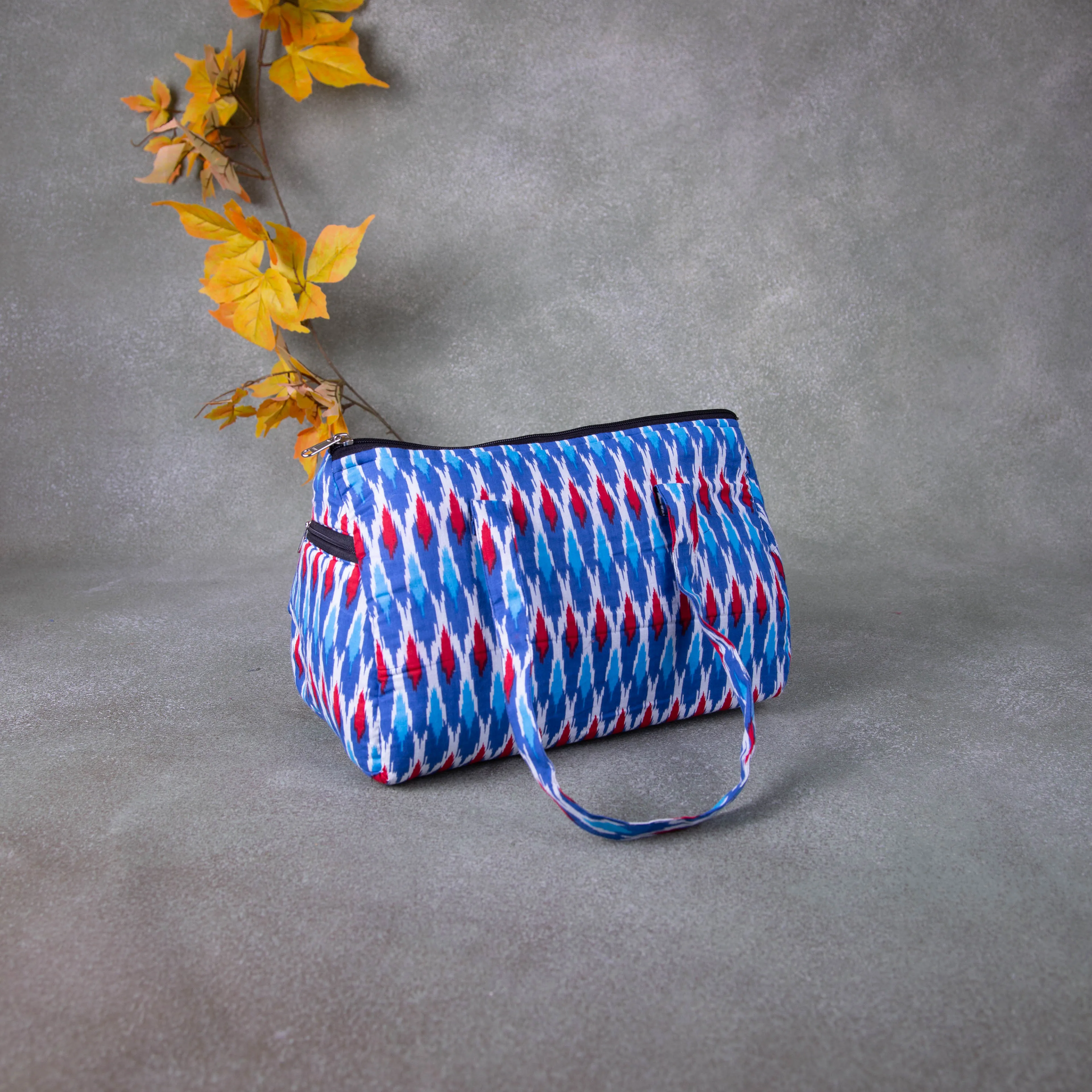 Barrel Handbags Blue Colour with Ikat Prints.