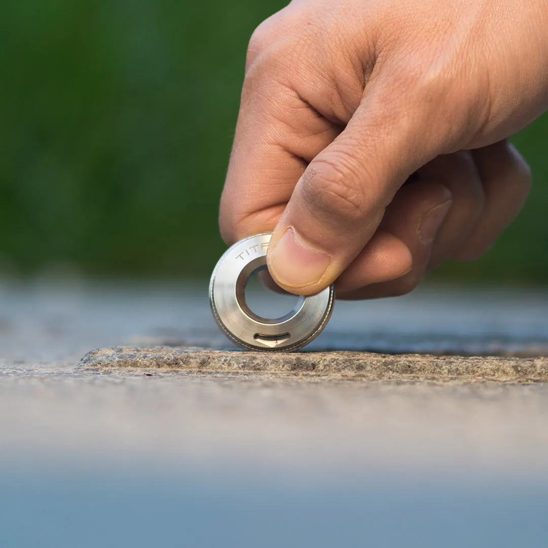 Tiroler: Exquisite Titanium Curve Measure Ring on Fingertips