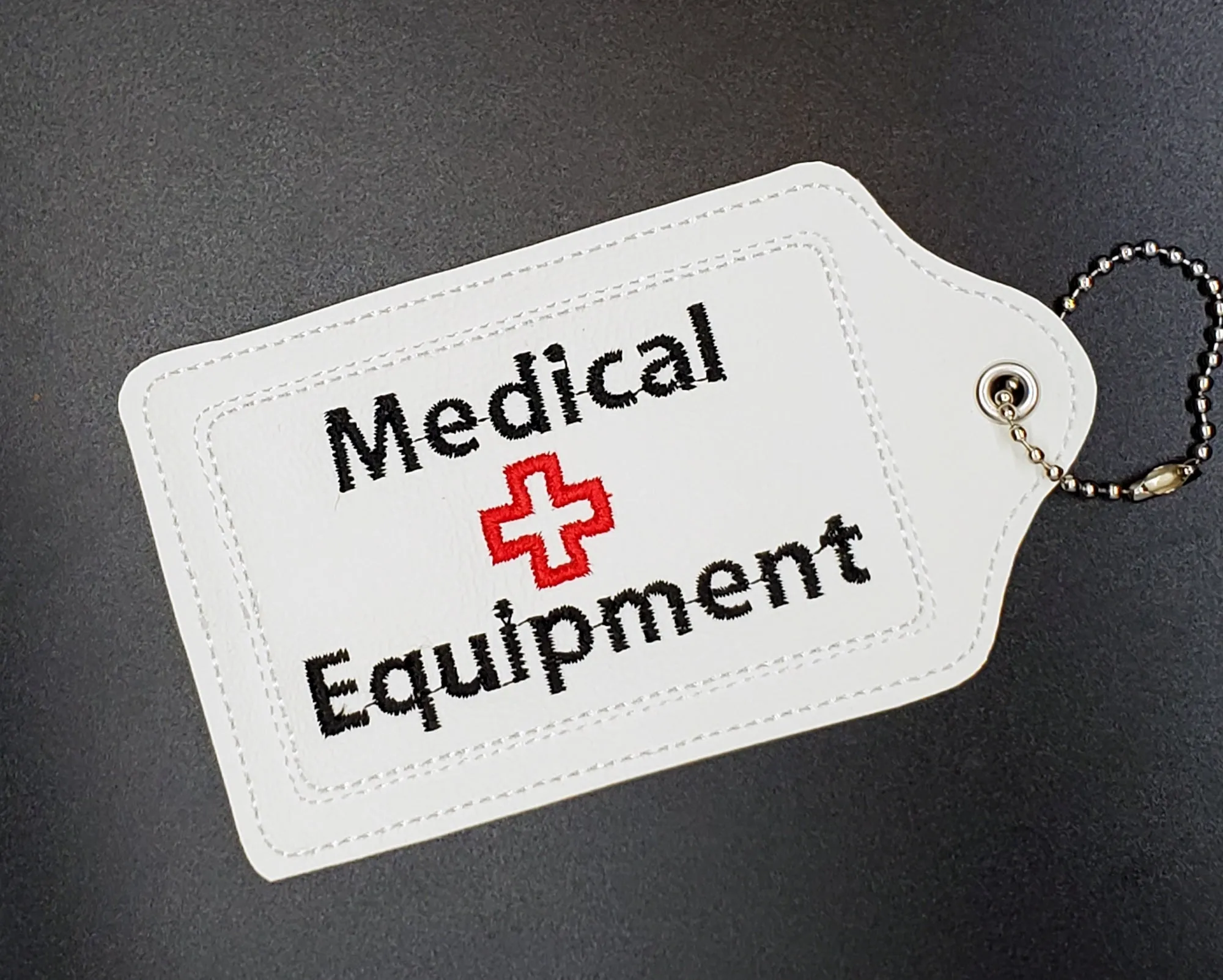 White Medical Equipment Luggage Tag